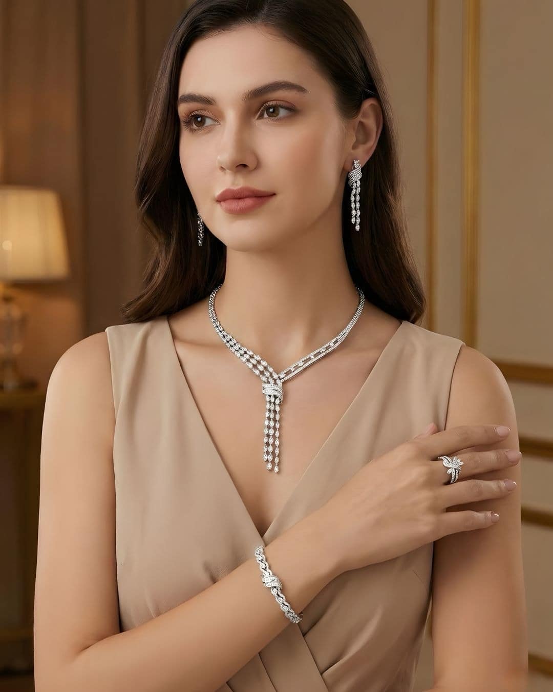 6c99894c-b232-4978-a307-83b4a5f3d8ae 4 piece silver tone ribbon jewelry sett