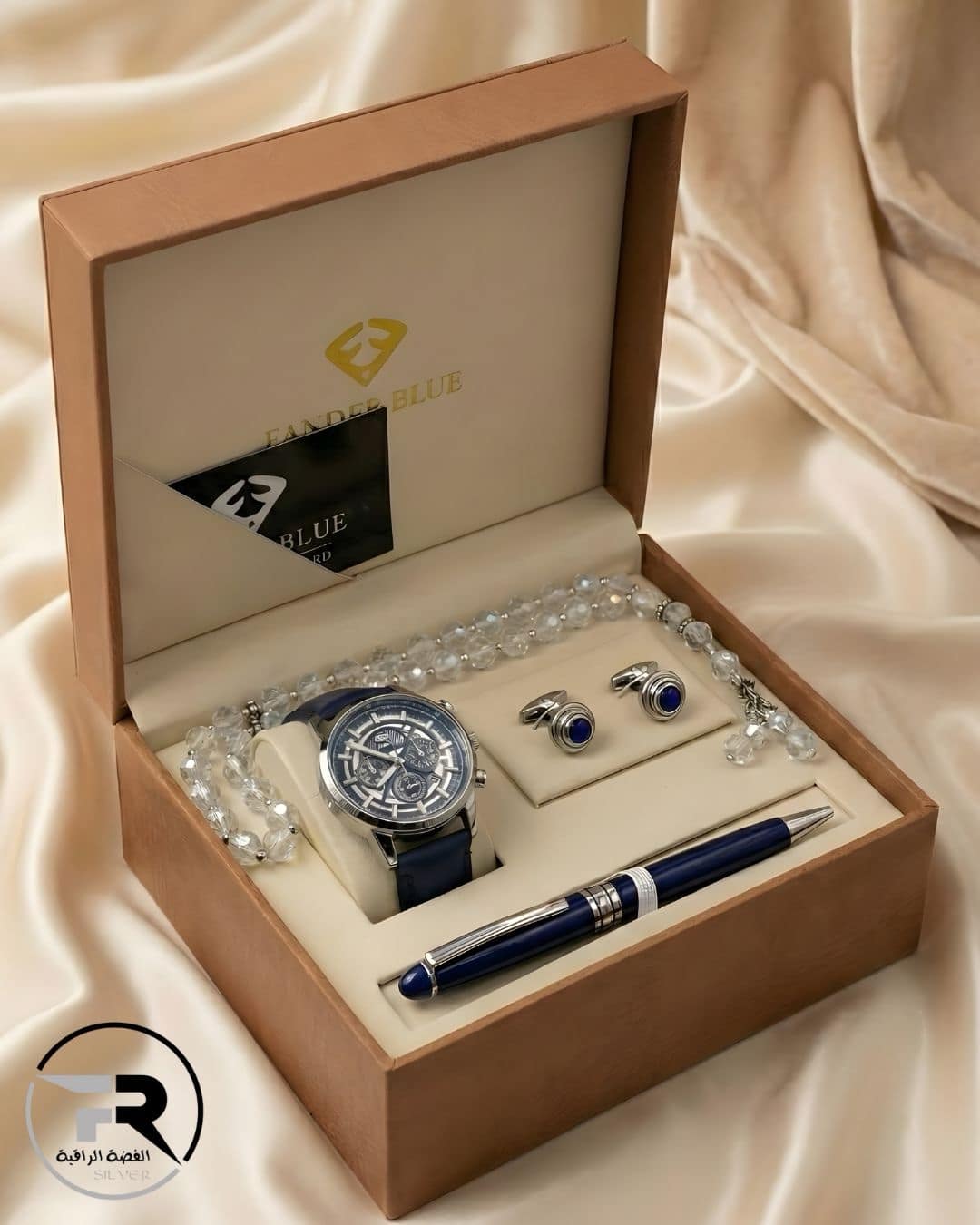 mens-luxury-gift-set-rose-gold-watch-pen-cufflinks-misbaha A premium men's gift set featuring a rose gold chronograph watch with a black leather strap, matching cufflinks, a sleek black and rose gold executive pen, and a black beaded prayer rosary (Misbaha), all presented in a luxury wooden box