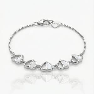 Home 2 A delicate 925 Sterling Silver bracelet for women featuring five heart-shaped charms with white mother of pearl inlays, connected by a fine silver box chain with a lobster clasp and a 925 HK heart tag
