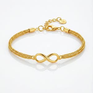 An elegant gold-plated bracelet for women featuring a polished infinity symbol as a central focal point, connected to multi-strand textured gold chains with a lobster clasp and adjustable extender