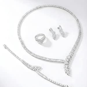 A Luxurious 925 Sterling Silver Jewelry Set for Women featuring an Intricate Leaf and Vine Pattern encrusted with Brilliant-cut and Baguette Zirconia Stones, including a Statement Necklace, Bracelet, Earrings, and Ring